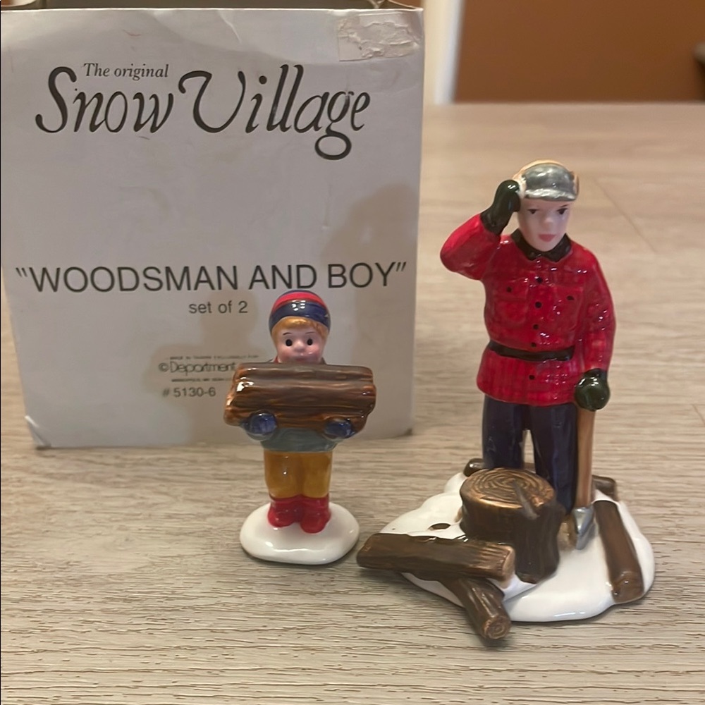 The Original Snow Village “Woodsman and Boy”